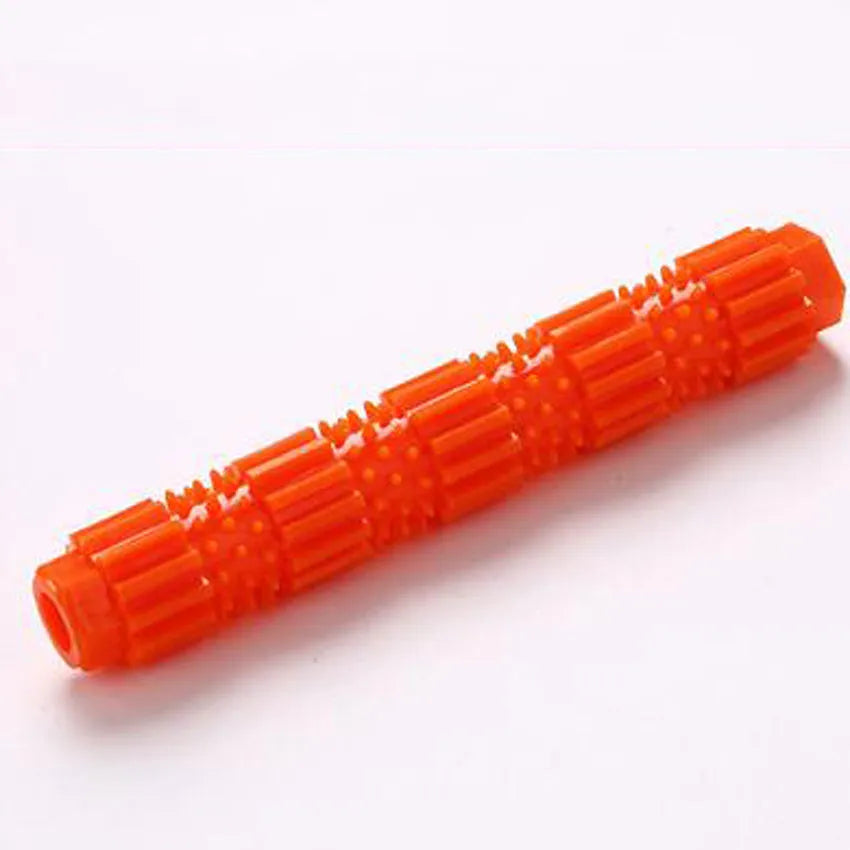 Green natural rubber dog chew toy with textured surface and treat holes for aggressive chewers