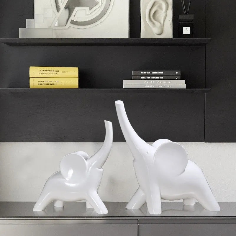 Modern resin fortune elephant ornament in rose gold or white colour, large and small sizes available.