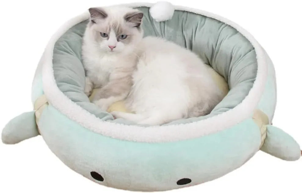 Green chick dinosaur shaped cat bed shown both flat and hanging as a hammock.