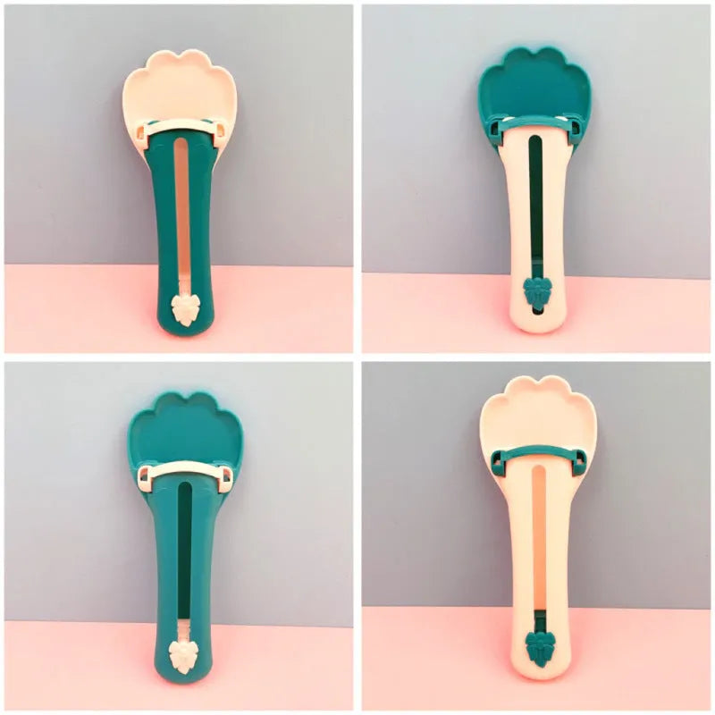 Multipurpose pet food dispenser tool in green and pink colours for squeezing liquid food and extruding treat bars
