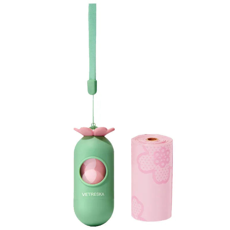 Portable dog poo bag dispenser capsule with scented inner bags in strawberry, orange, or cherry blossom options