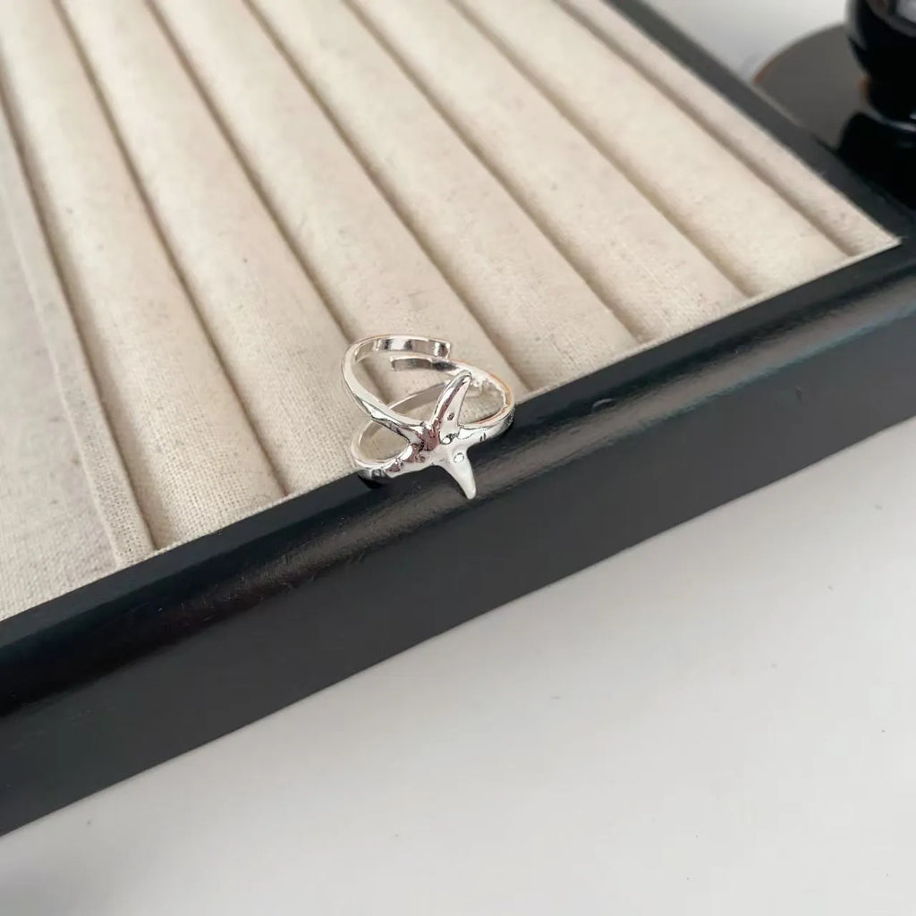 Adjustable open mouth ring with three-dimensional jasmine flower design and electroplated finish