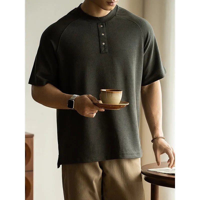 Casual loose pullover top with terry texture fabric and raglan sleeves in smoky grey colour