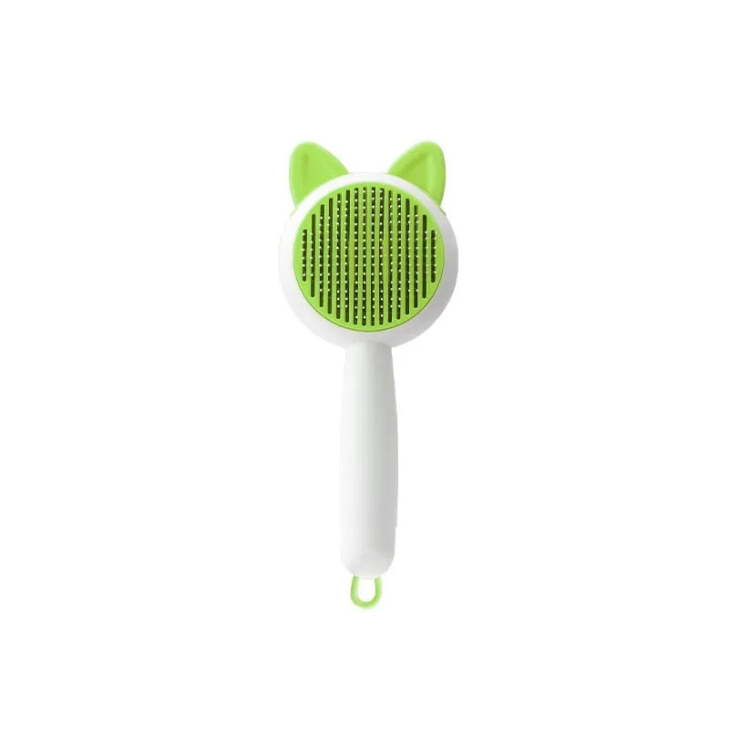 Self-cleaning cat grooming brush with stainless steel teeth in greenish white or orange white colour