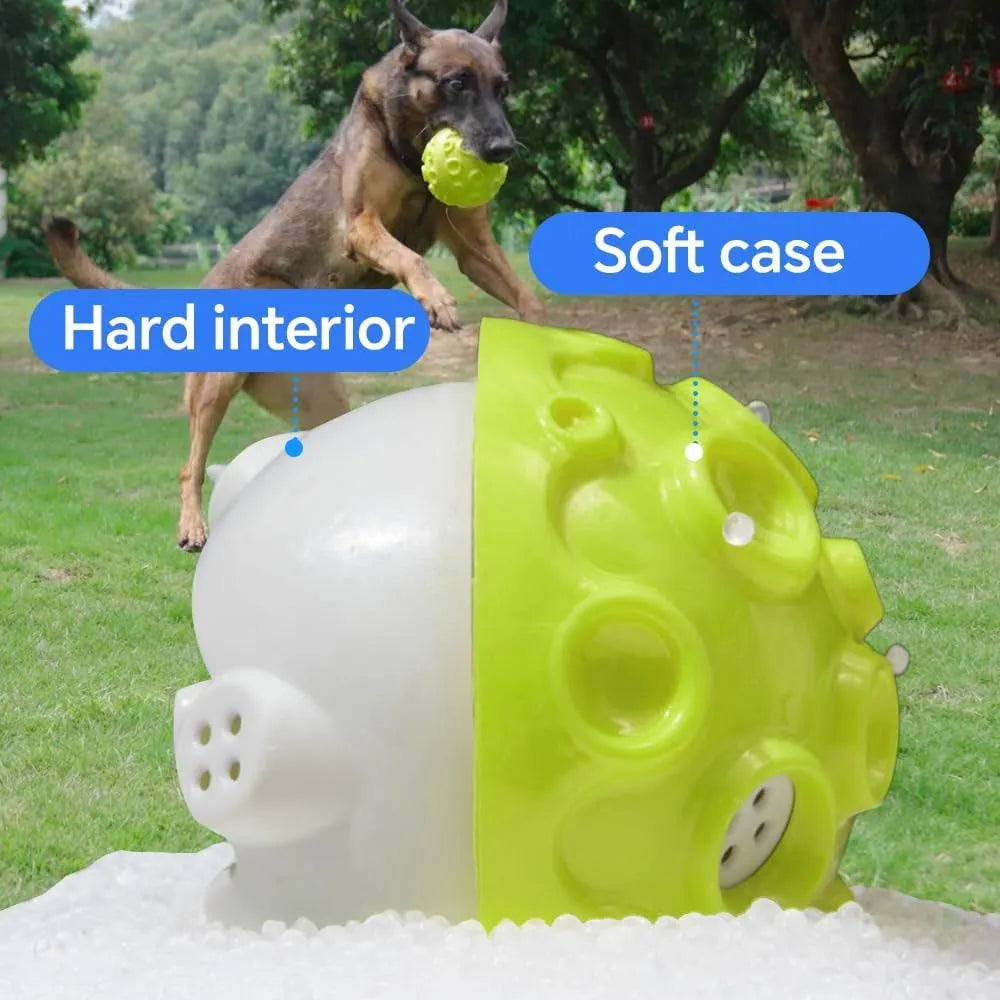 Colourful natural rubber dog chew ball with textured surface and meteorite-shaped bumps