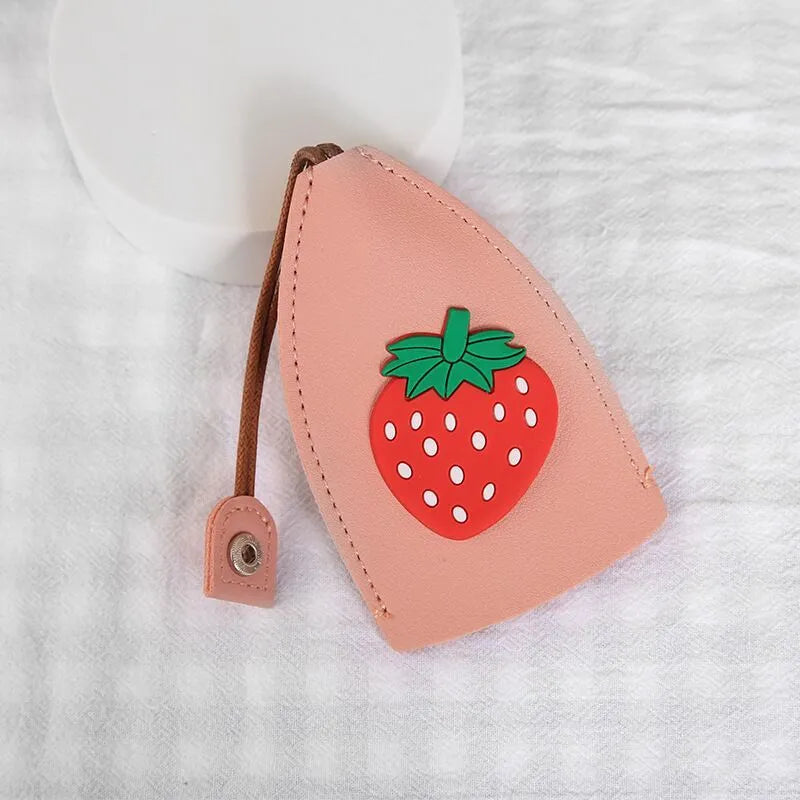 Cartoon PU leather pull-out car key case measuring 14 x 7.5cm with colourful designs