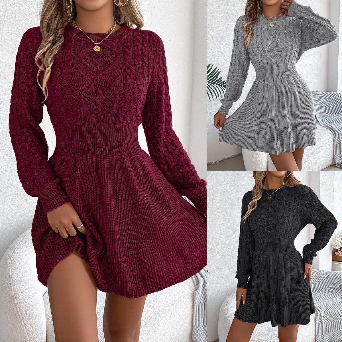 Black knit sweater dress with lantern sleeves and a twisted elastic waistband.