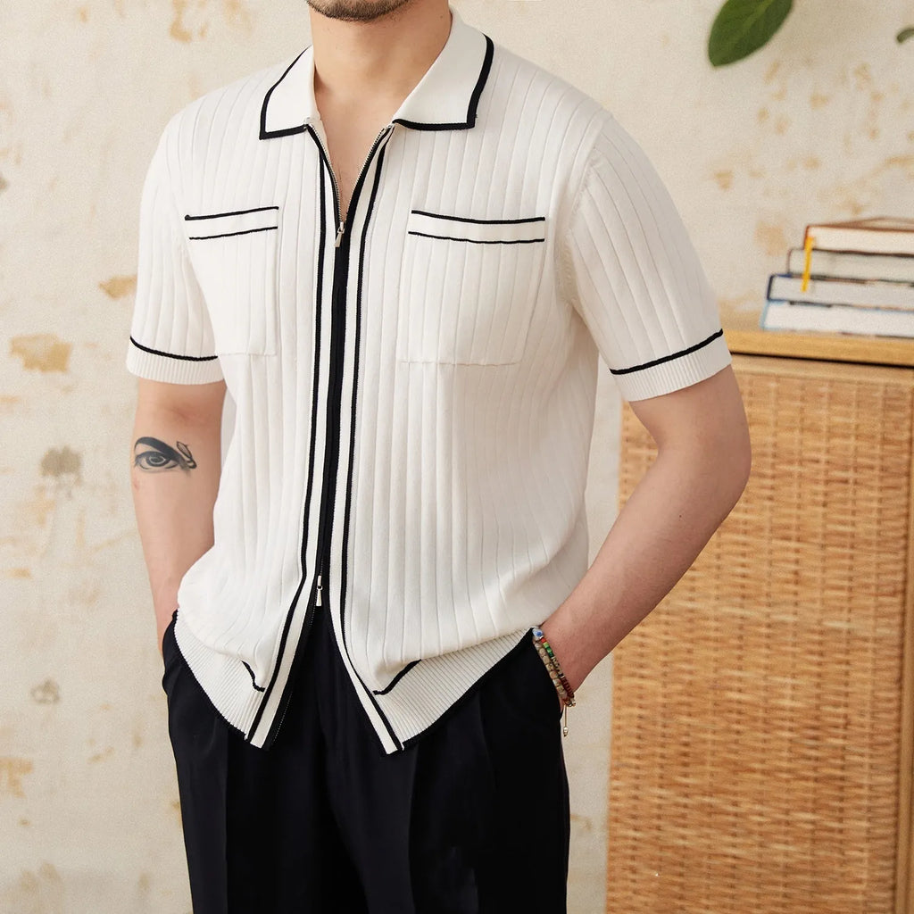 Slim black and white lapel polo shirt with short sleeves on a hanger