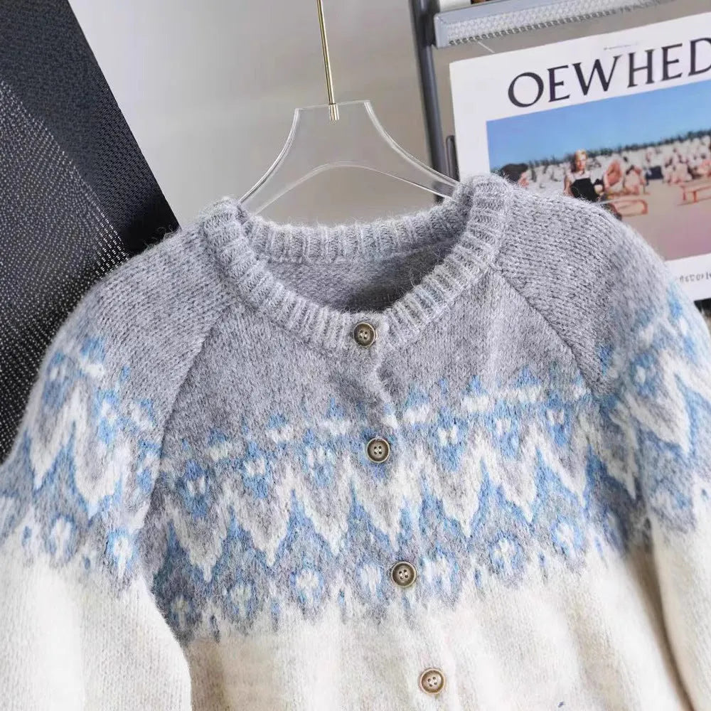 Women's jacquard-knit sweater coat in a contrast colour design with long sleeves.