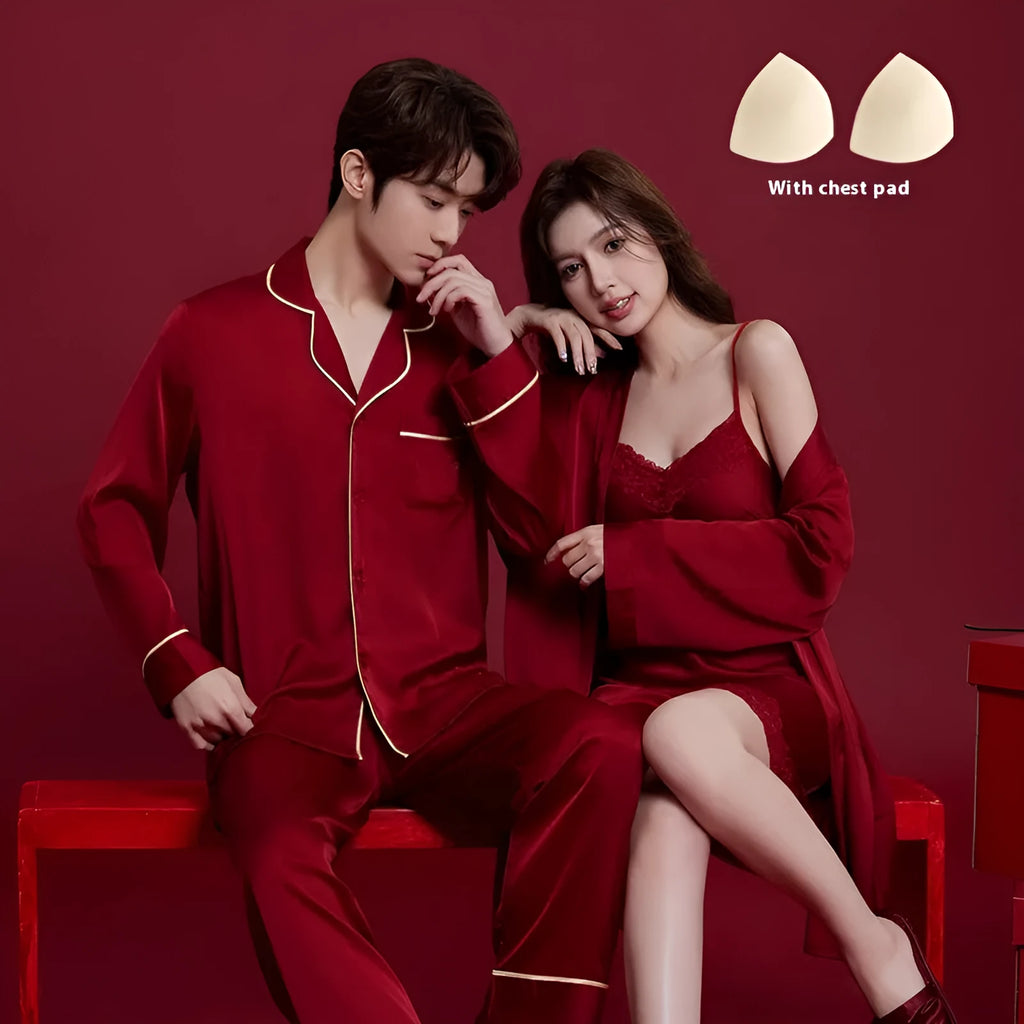Red matching men's and women's silk sleepwear set with long sleeves and trousers.