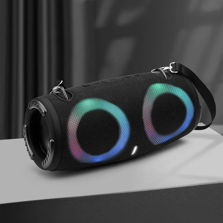 War Drum portable Bluetooth speaker in multiple colours with RGB lights and carrying strap.
