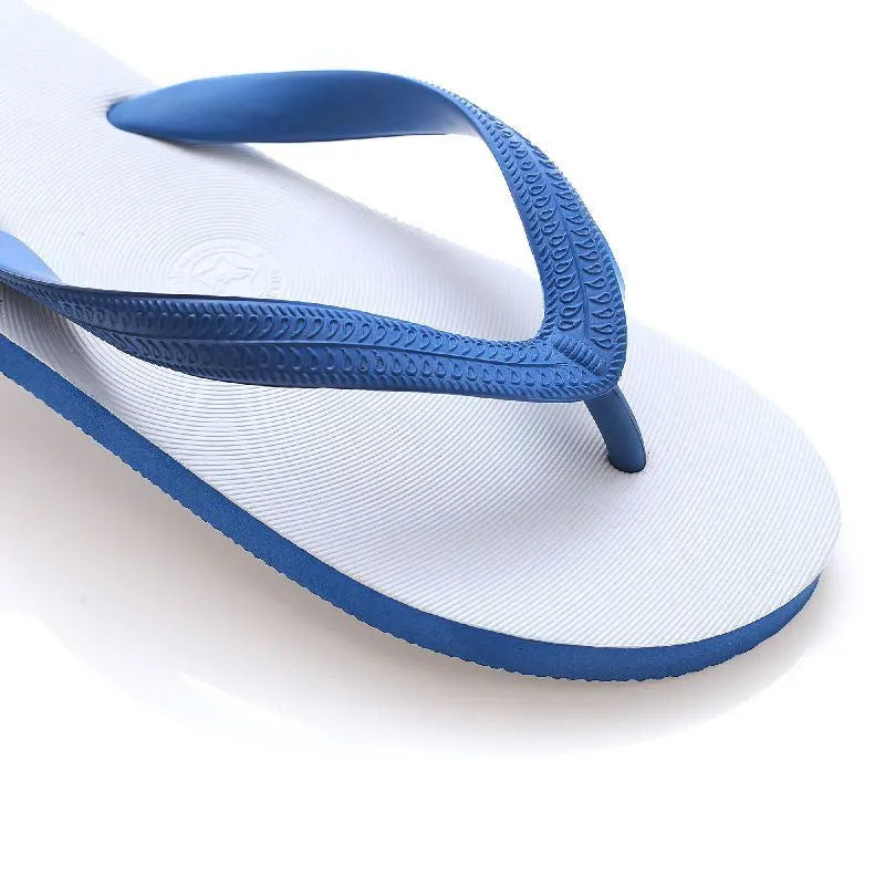 Rubber flip-flops with fish label branding in green, red, blue, and black colours showing non-slip sole
