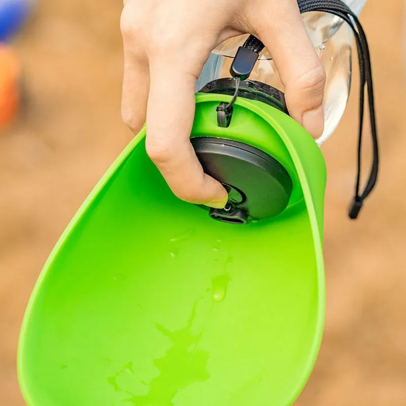 Sky blue portable pet water bottle with drinking sink and key-lock, showing 680ml capacity.