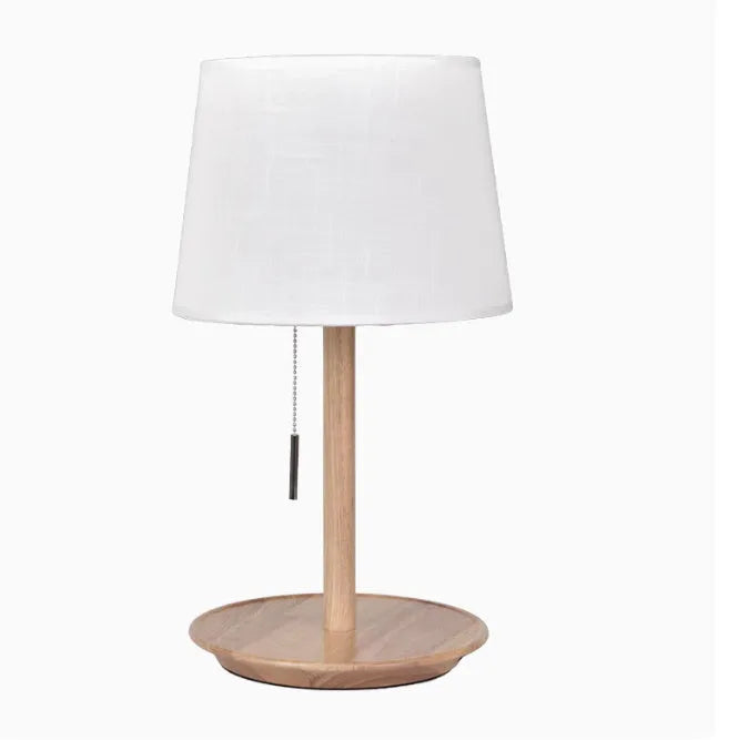 Walnut colour solid wood bedside lamp with cloth shade and cable switch