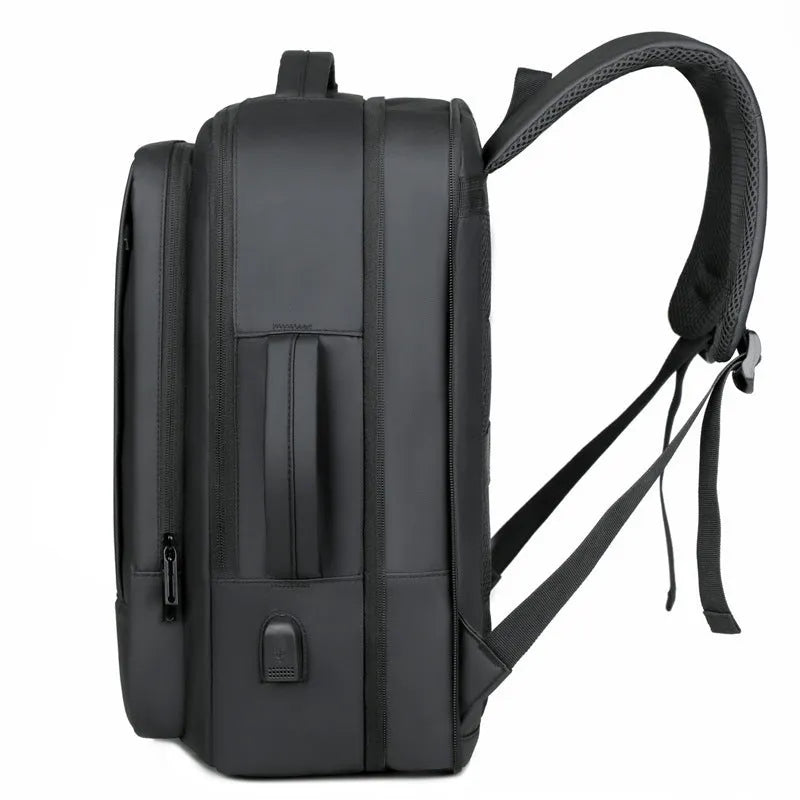 Black Oxford cloth business backpack with shoulder straps showing 20-35L capacity