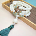 White jade bodhi bracelet with 108 beads showing three style pattern options and multiple bead sizes