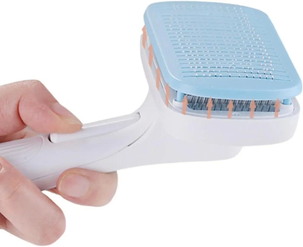 Automatic pet hair removal comb in blue, showing handheld design with comb head.