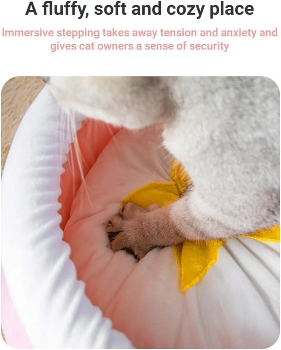Pink honey pot-shaped cat sofa bed with a soft, removable grey nest pad inside.