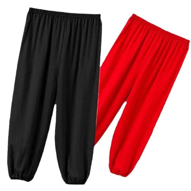 Children's black high elasticity Sanda practice pants with loose fit for martial arts training