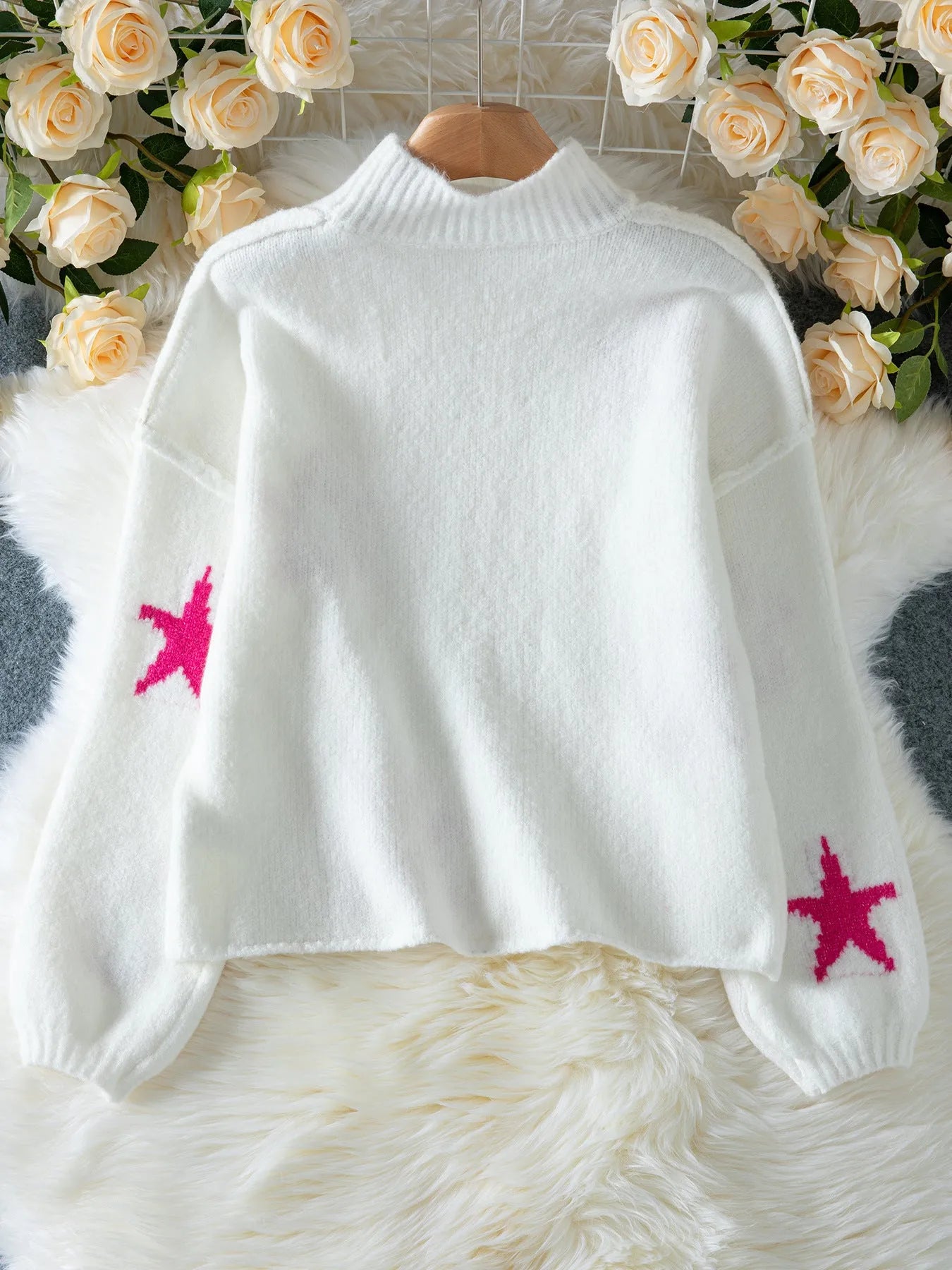 White women's turtleneck pullover with contrast star pattern on imitation velvet fabric