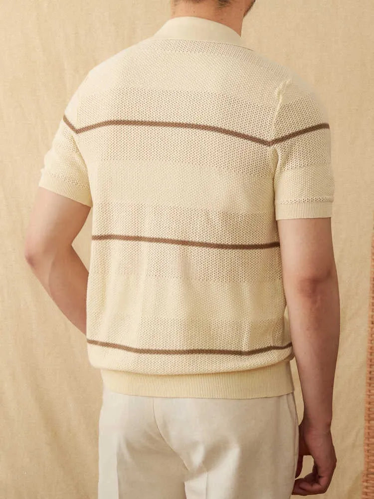 Camel coloured short sleeve knitted cardigan with lapel collar on a hanger