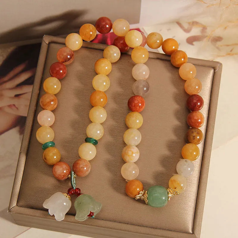 Women's natural jinsi jade multi-layer bracelet with orchid pendant on adjustable fastening