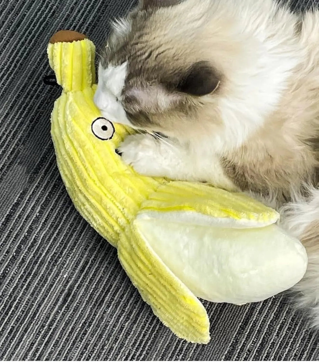 Yellow banana-shaped plush cat toy with crinkle paper and velvet texture strip