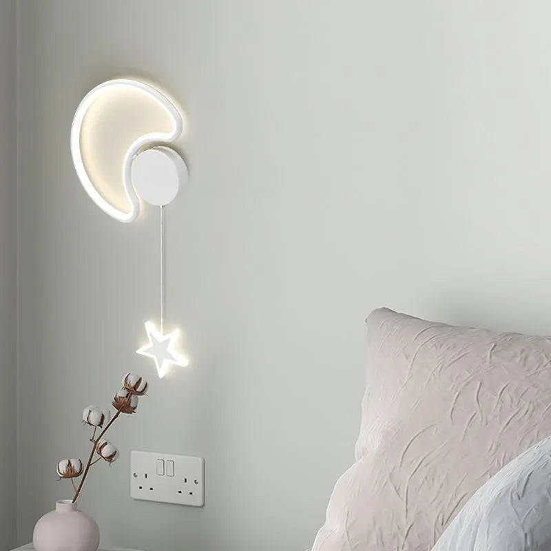 White cloud and five-pointed star children's wall mounted LED night light with three colour settings.