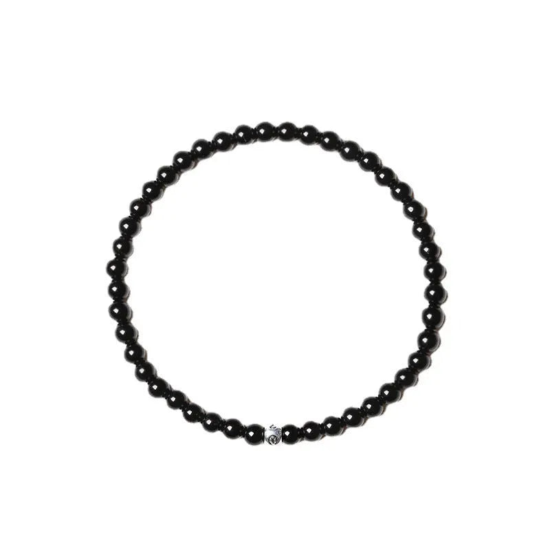 Geometric cut surface black agate bracelet with 4mm obsidian, blue san, and black agate beads