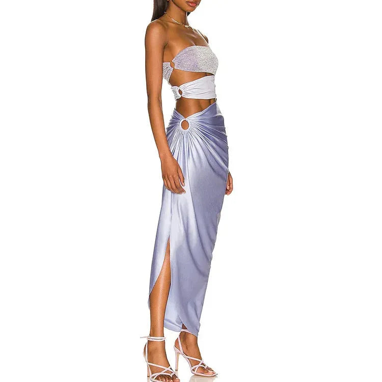 Purple hollow polyester swimsuit and matching wrap skirt set on mannequin