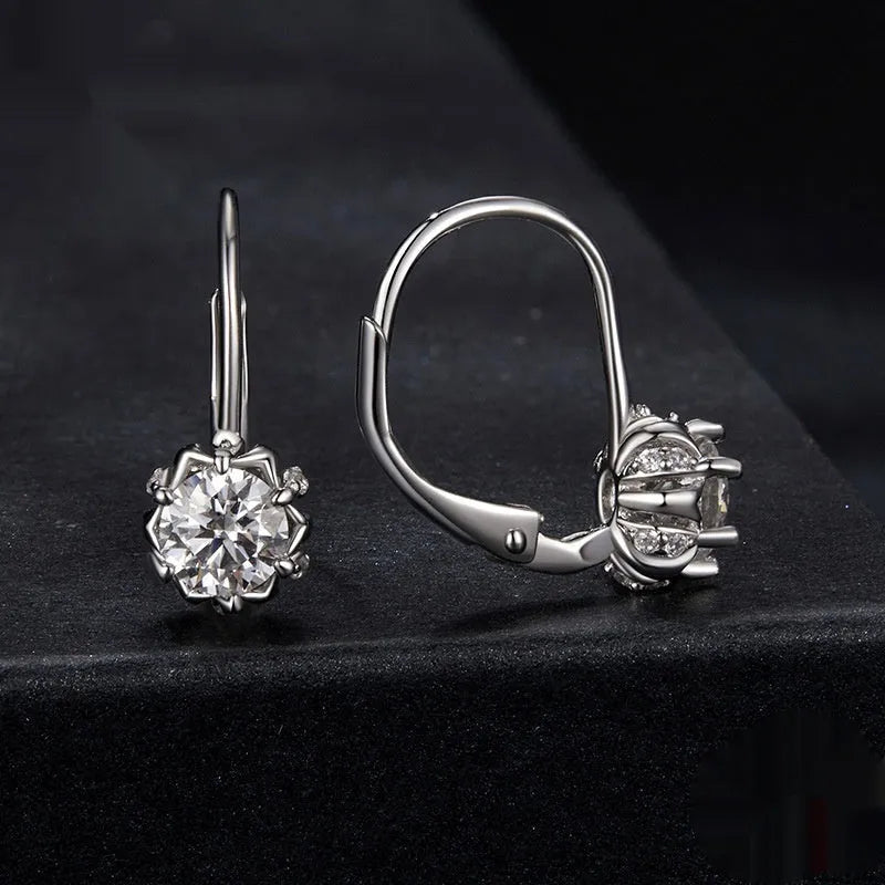 Flower bud design clip earrings in sterling silver with moissanite stone and white gold plating