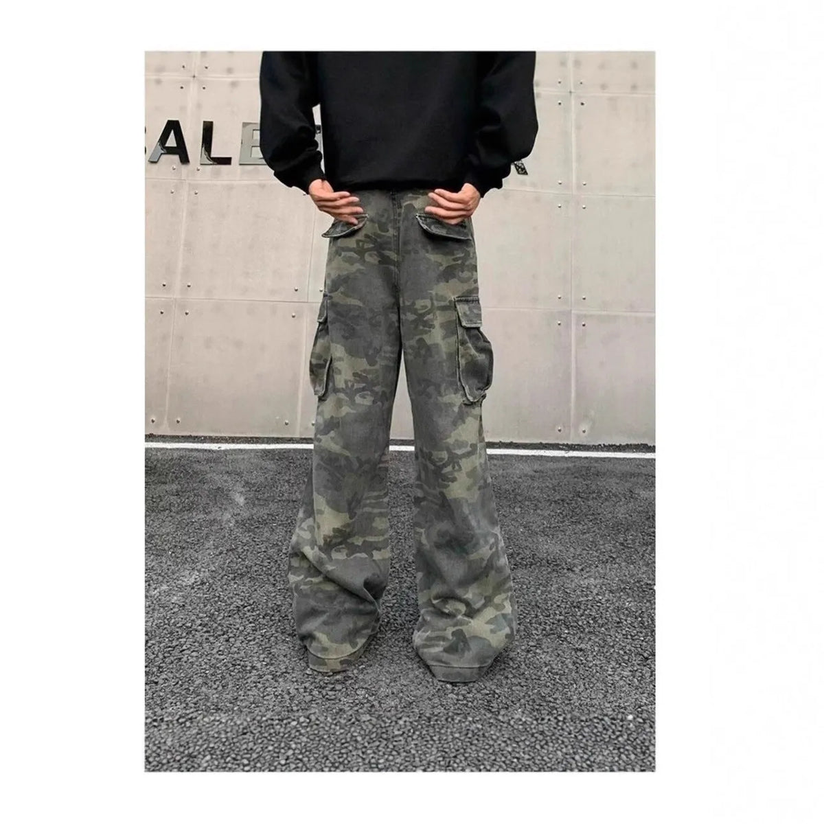 Cotton blend cargo pants with washed camouflage print and multiple pockets