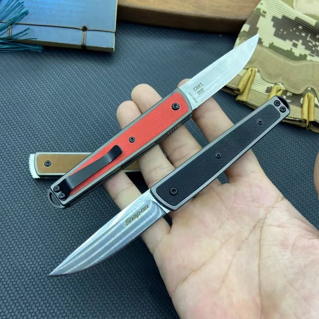 Folding fruit knife with stainless steel blade in black, brown, or red colour options