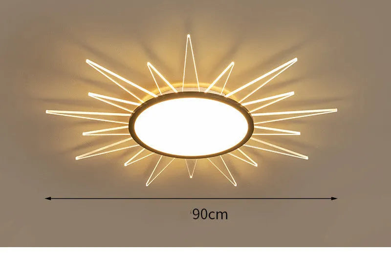 Modern circular aluminium LED ceiling lamp with remote control shown in room setting