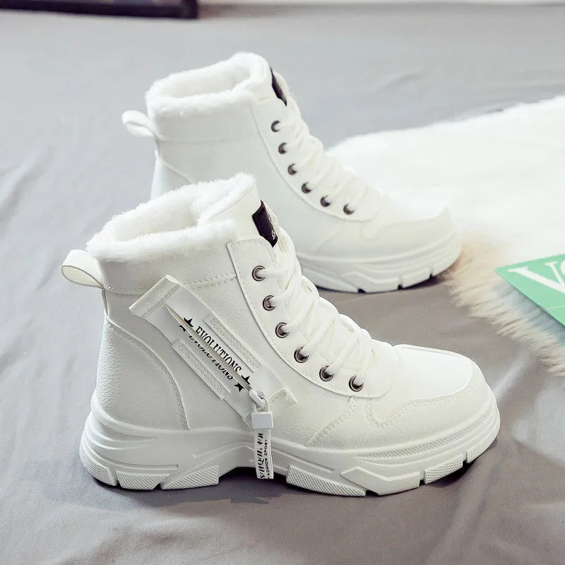 Plus size women's snow boots in black with fleece lining and lace-up front