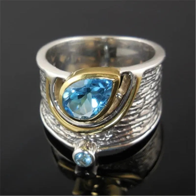 Women's creative Chinese style alloy ring with a drop-shaped inlaid blue rhinestone zircon.