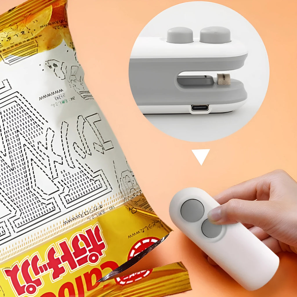 Handheld white vacuum sealer with cutter blade and magnetic back for bag sealing