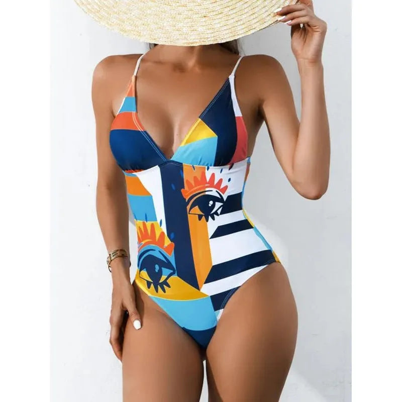 Plus size solid blue one-piece swimsuit with a backless design on a mannequin.