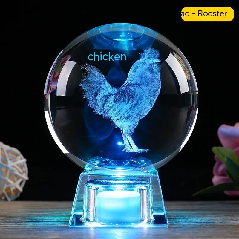White crystal zodiac ornament with electronic luminous base showing Chinese animal design