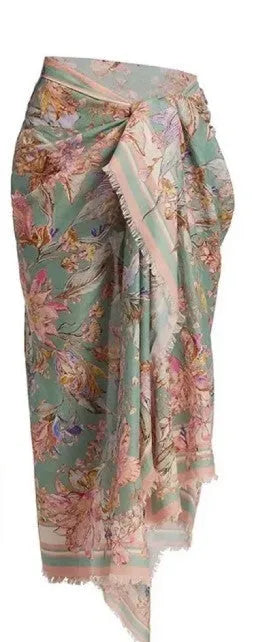 Women's floral bikini swimsuit set with top, briefs, and skirt in creamy-white beige colour