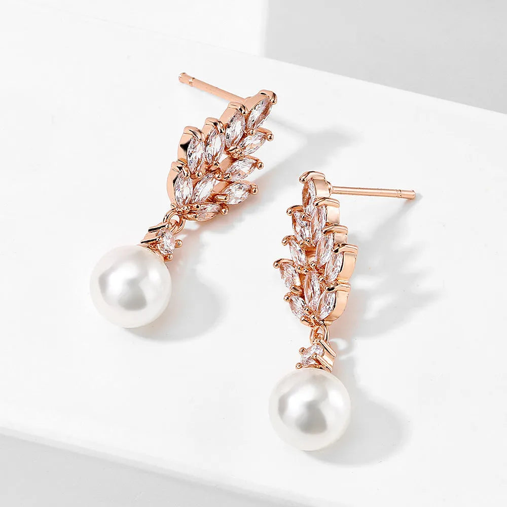 Geometric floral earrings with micro inlaid zircon detailing in gold, platinum, or rose gold plating options