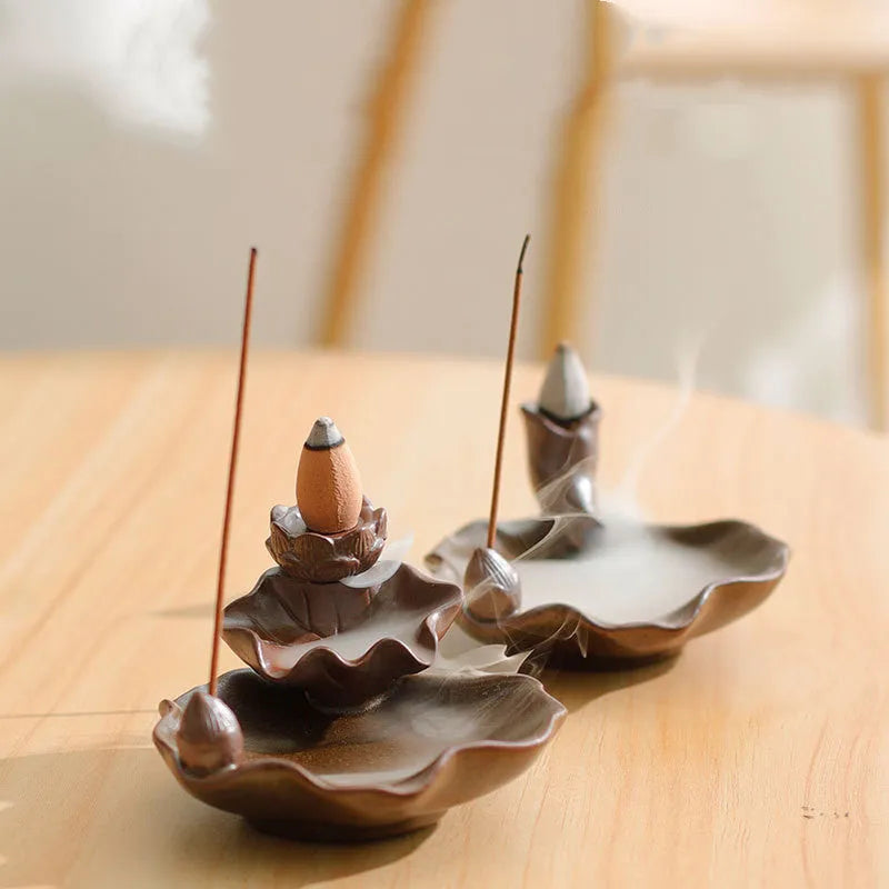 Square ceramic reverse flow incense burner with purple clay construction and lotus plum blossom decoration