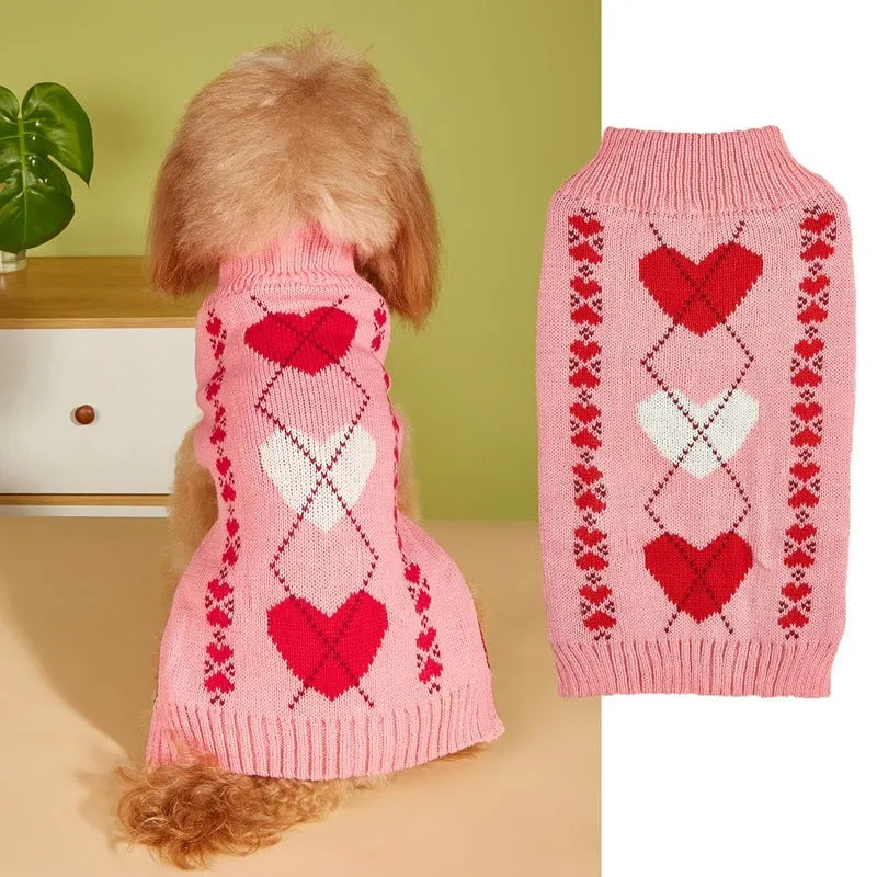 Red dog sweater with a white love heart pattern on the back, sized for a small dog.