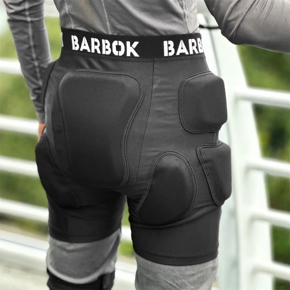 Black protective hip pad made of spandex with NBR foam padding for roller skating and skateboarding.
