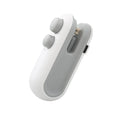 Handheld white vacuum sealer with cutter blade and magnetic back for bag sealing