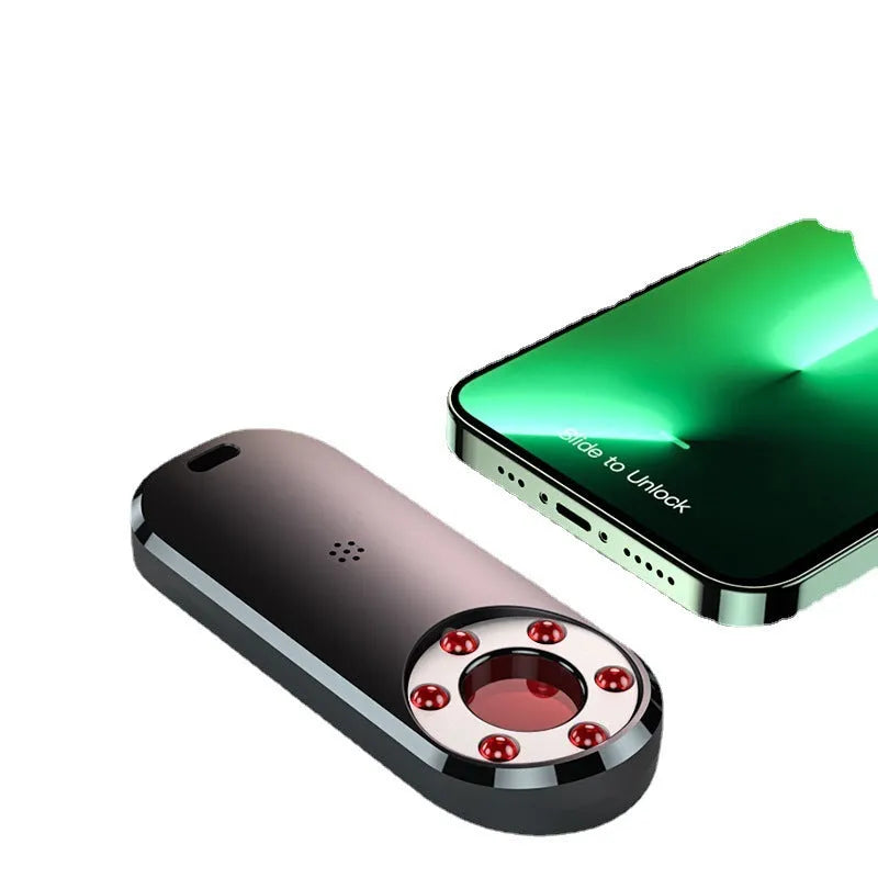 AK400 portable infrared frequency detector with USB cable, showing compact size.