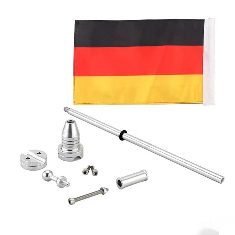 Black and silver steel motorcycle luggage rack flagpole for side box mounting.