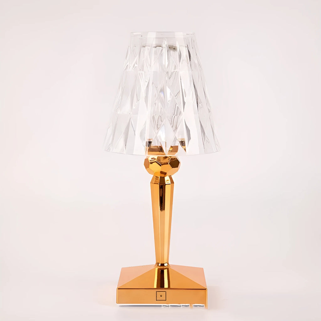 Rose gold portable touch-control projection night light on a tabletop