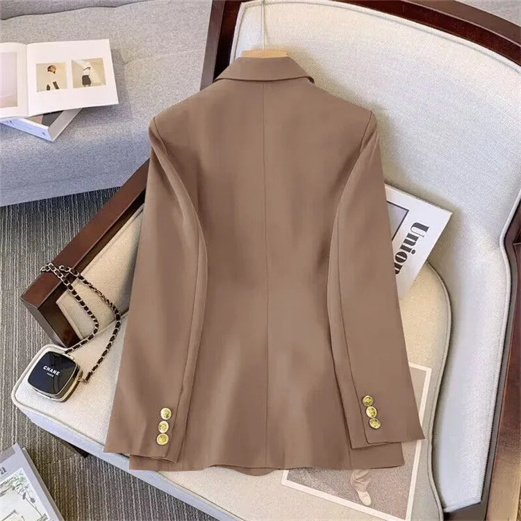 Women's loose fit polyester blouse in black, shown as part of a commute outfit.