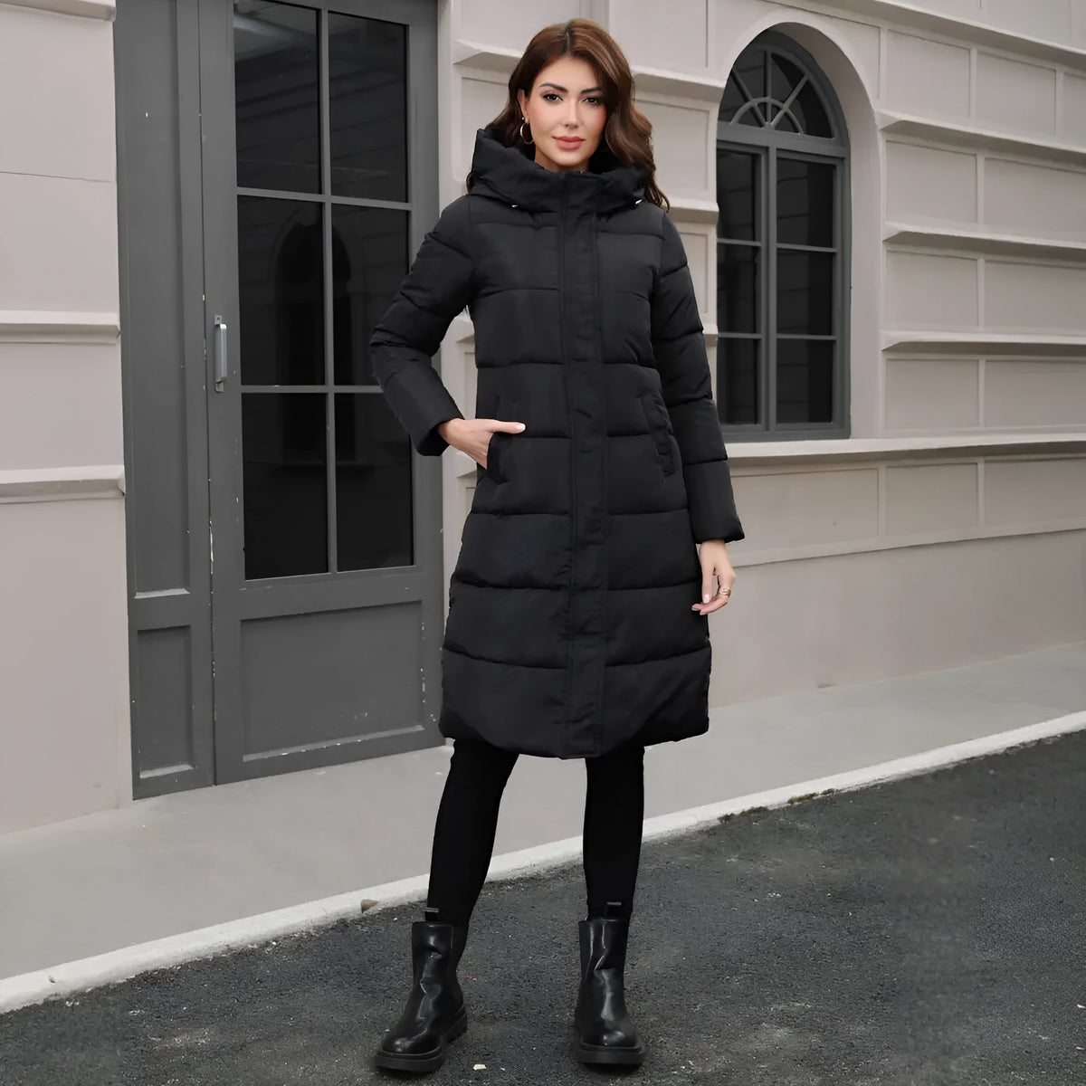 Black slim fit hooded jacket with long sleeves and cold-resistant polyester construction